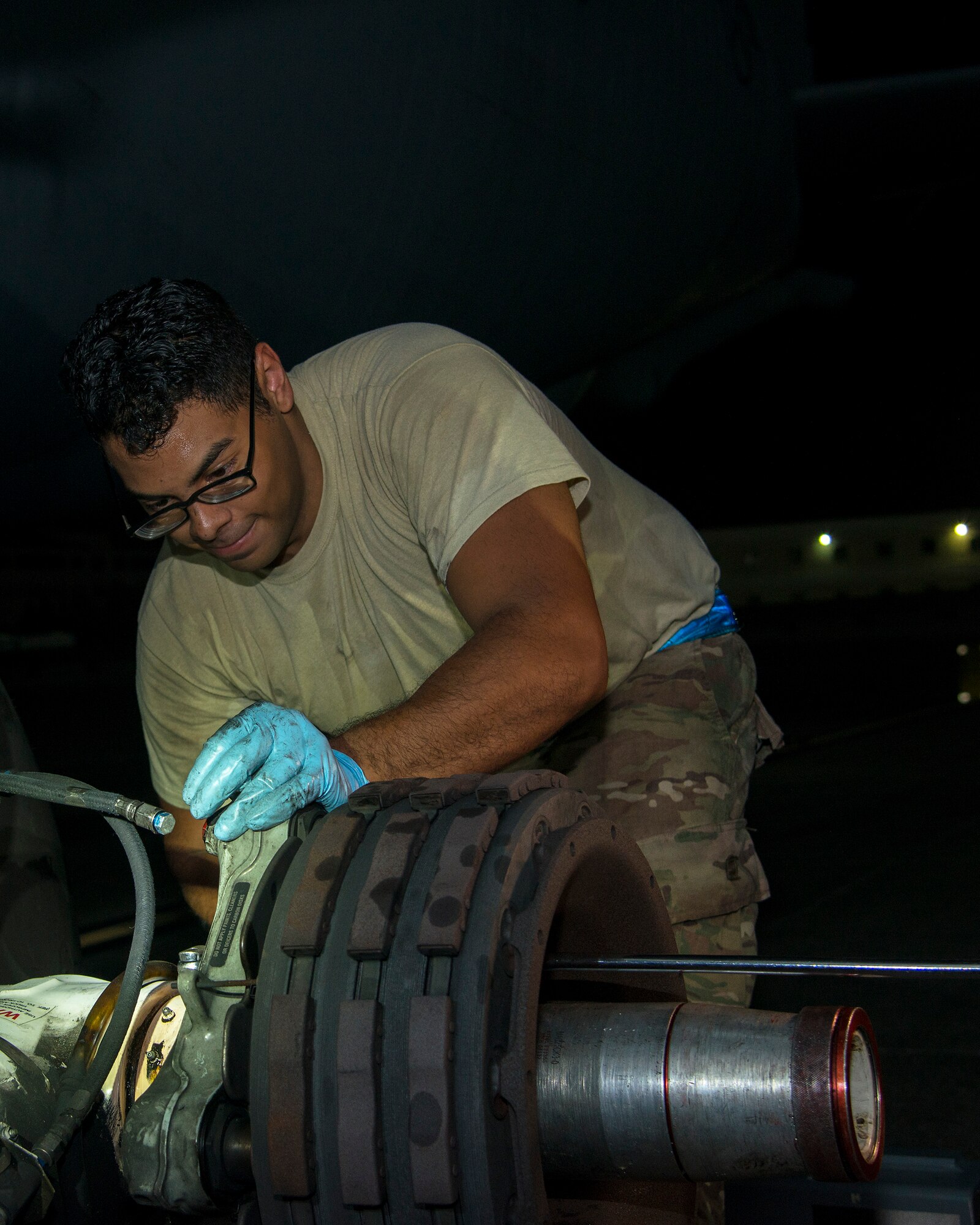 U.S. Air Force Airman 1st Class Lorenzo Hernandez, a 6th Aircraft Maintenance Squadron dedicated crew chief, removes a KC-135 Stratotanker brake at MacDill Air Force Base, Fla., Aug. 12, 2019.