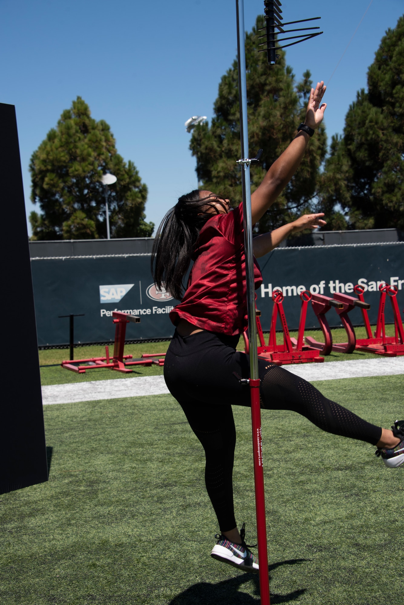 A U.S. Airman from Travis Air Force Base, California, competes in the vertical jump Aug. 13, 2019, during the Salute to Service Boot Camp in Santa Clara, California. The event provided Airmen with an opportunity to interact with NFL players and compete against one another in a variety of athletic drills. (U.S. Air Force photo by Tech. Sgt. James Hodgman)