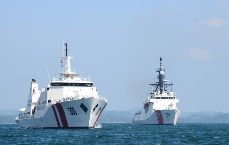 The Coast Guard Cutter Stratton (WMSL 752) sails alongside the Indonesian Bakamla (coast guard) vessel KN Tan Jung Datu in the Singapore Strait, Aug. 11, 2019. The Stratton’s crew is participating in various professional exchanges with various Indo-Pacific nations alongside the U.S. Navy.