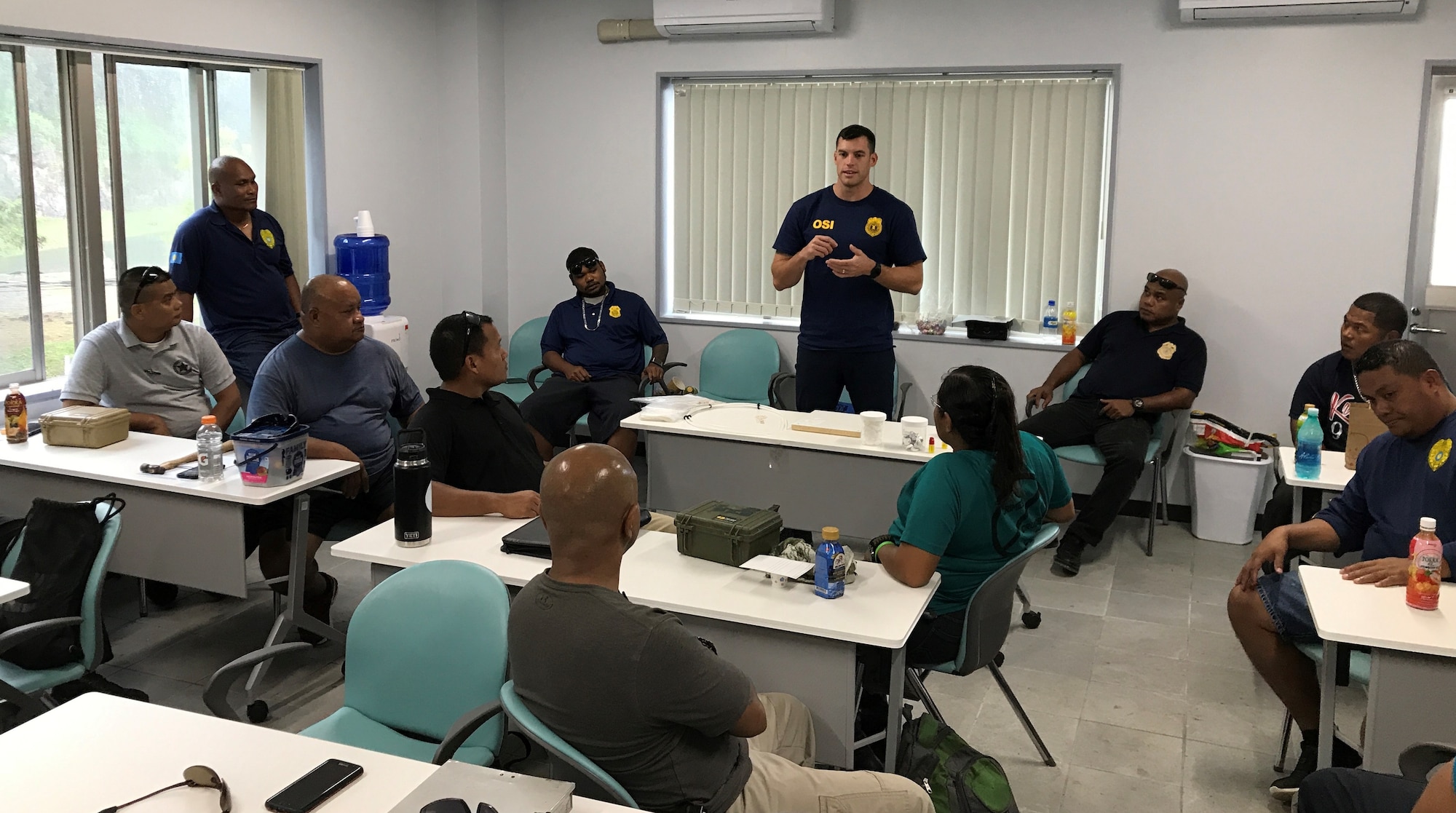 Special Agent Jefferson Fraser conducts a classroom session in Palau as part of the AFOSI Region 6 Special Missions Branch Law Enforcement Investigative Skills Exchange Program with Indo-Pacific partners July 17-19 and 24-26, 2019. (Photo submitted by 6 FIR/SMB)