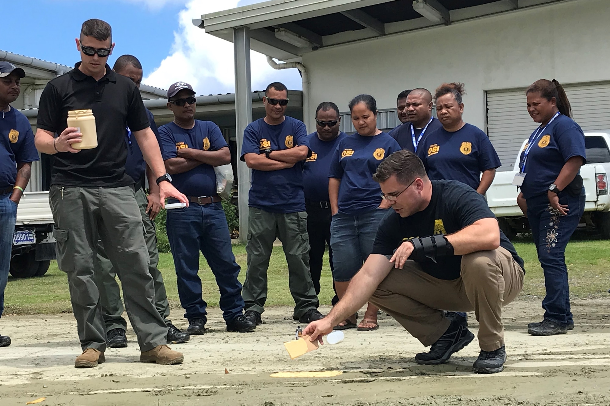 Special Agents Michael Showers, right, and Christopher Stahly conduct a session in the State of Yap as part of the AFOSI Region 6 Special Mission Branch Law Enforcement Investigative Skills Exchange Program with Indo-Pacific partners July 17-19, and 24-26, 2019. (Photo submitted by 6 FIR/SMB)