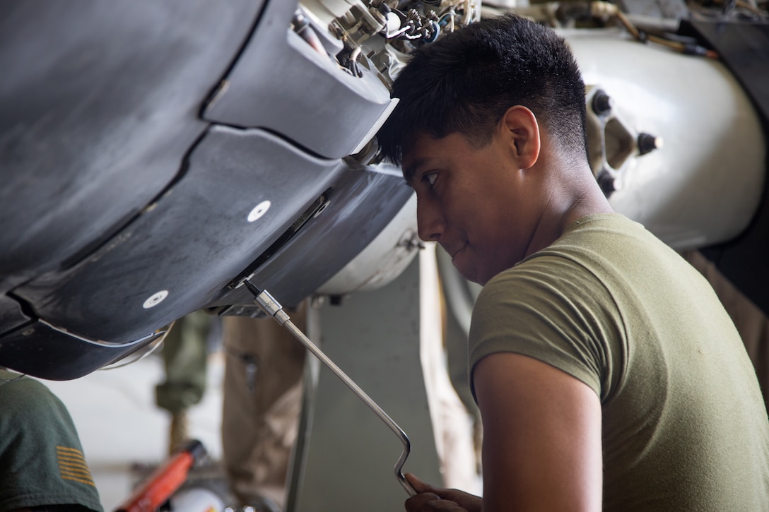 U.S. Marine Cpl. Bryant Castaneda, a tiltrotor mechanic assigned to Marine Medium Tiltrotor Squadron 263, conducts aircraft maintenance during Integrated Training Exercise 5-19 at Marine Corps Air Ground Combat Center, Twentynine Palms, Calif., Aug. 8, 2019. ITX 5-19 is a large scale, combined-arms training exercise that produces combat-ready forces capable of operating as a Marine Air-Ground Task Force. (U.S. Marine Corps photo by Cpl. Cody Rowe)