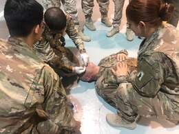 Spc. Taylor M. Nowak, 77th Sustainment Brigade combat medic/health care specialist, U.S. Army Reserve, participates in a medical workshop to help teach the Kuwaiti Land Forces basic life support steps necessary on the battlefield at the Kuwait North Military Medical Complex, July 31, 2019. The workshop uses the U.S. Army Combat Lifesaver Course as the foundation for the training.