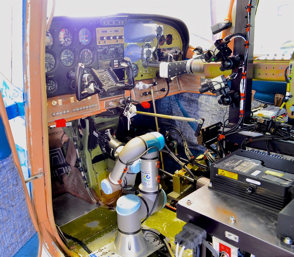 A Cockpit view of ROBOpilot attached to seat rails with no permanent modifications to the aircraft. (Courtesy photo)
