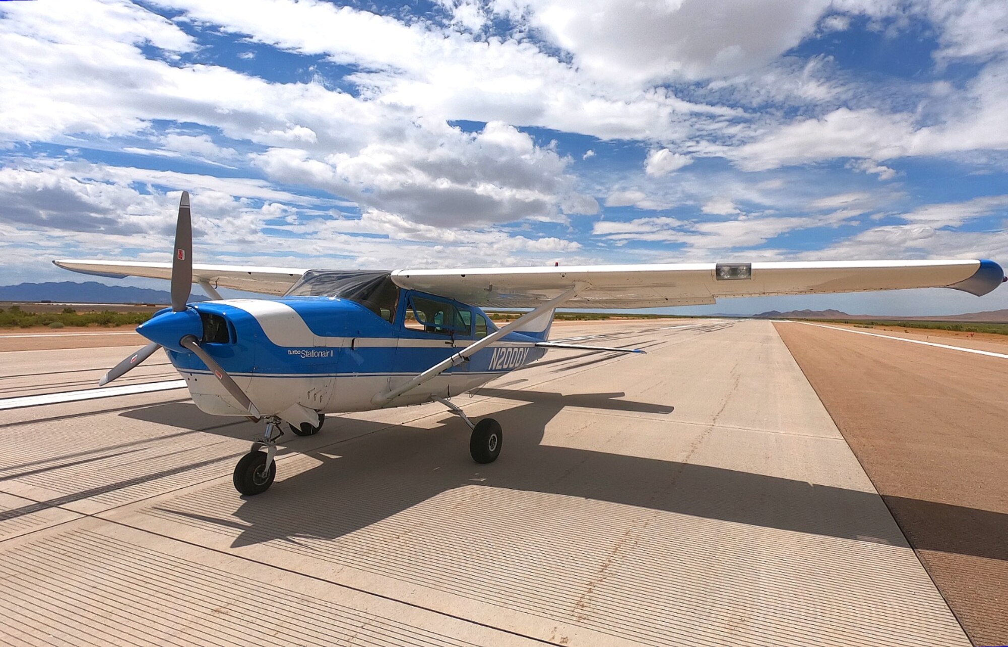 A 1968 Cessna 206 with ROBOpilot installed preparing for engine start on the runway at Dugway Proving Ground, Utah. (Courtesy photo)