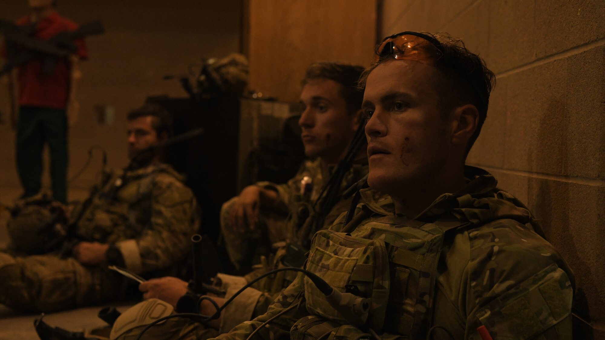 2nd Lt. Parker Gray, 13th Air Support Operations Squadron tactical air control party officer, rests during an exercise pause July 17, 2019 on Fort Carson, Colorado. During the pause, the instructors gave feedback to the students on how they had performed during the exercise. (U.S. Air Force photo by Airman 1st Class Andrew Bertain)