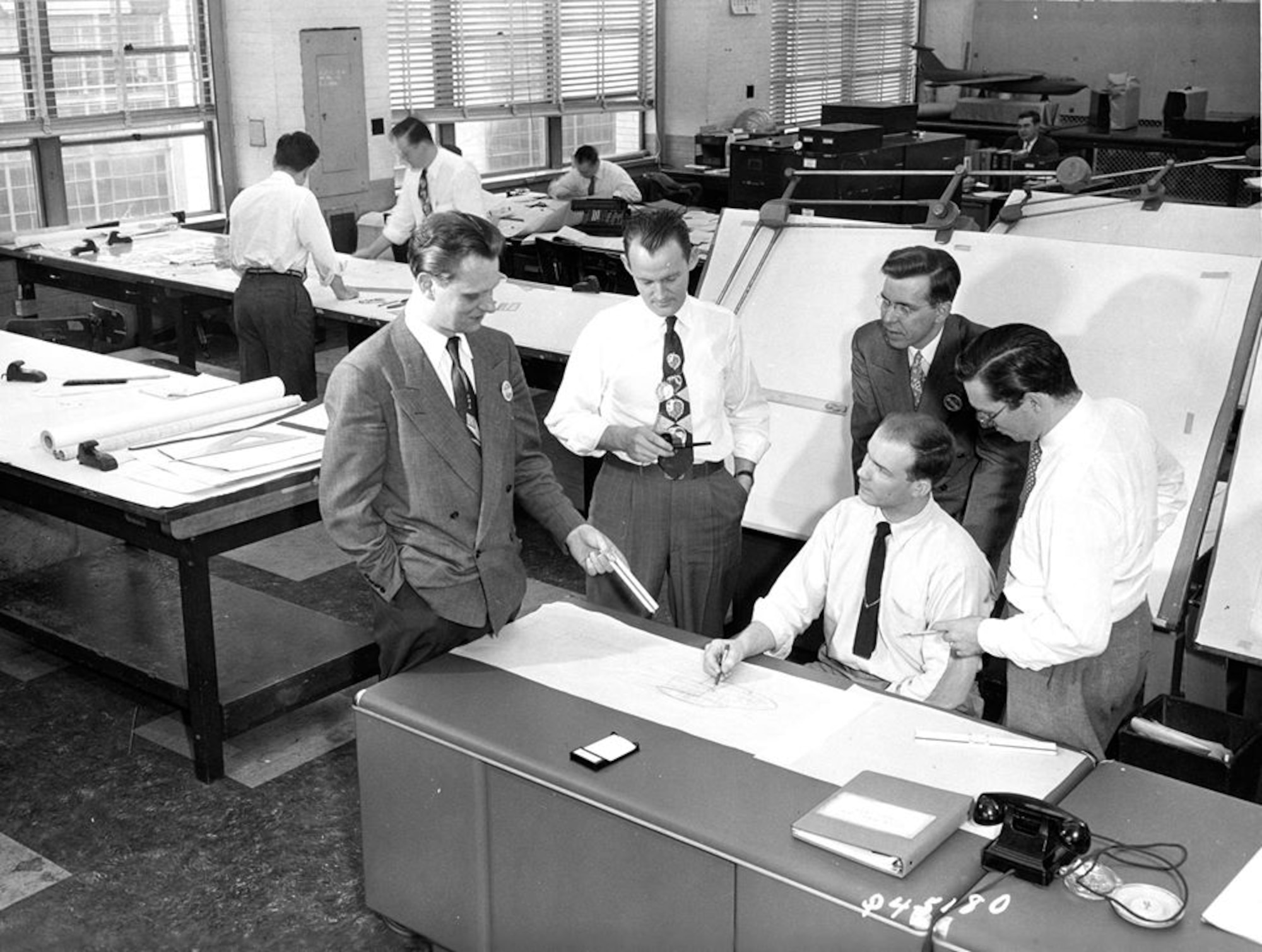 Hans Multhopp Sr. (left), at the former Glenn L. Martin Company, where he was a pioneer in aircraft design working closely with Air Force researchers. His son, Air Force Research Laboratory engineer Dieter Multhopp, is retiring in August 2019 from a 40-year career during which he also contributed to many experimental aircraft. (Photo courtesy of Glenn L. Martin Company)