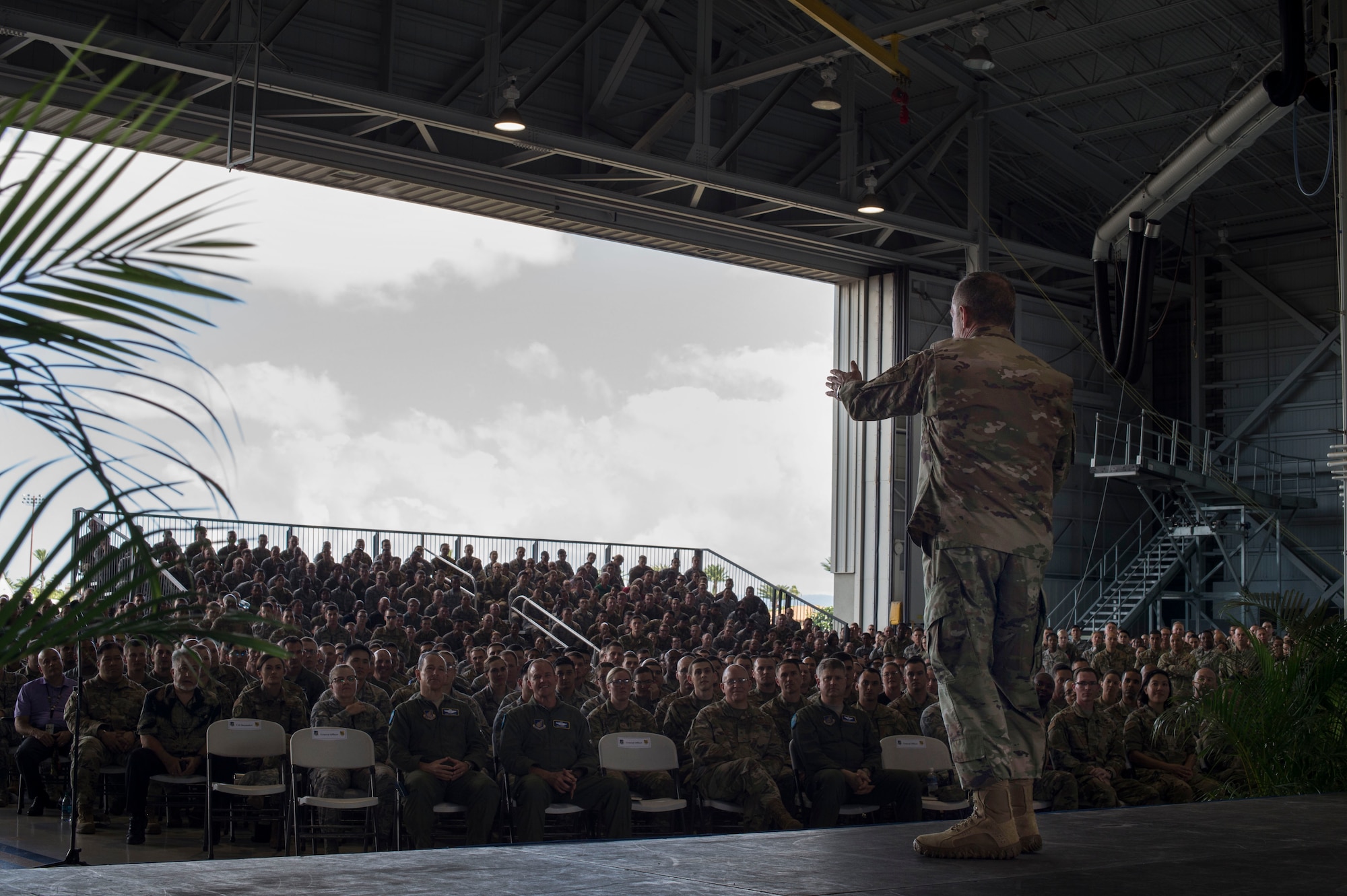 Air Force Chief of Staff Gen. David L. Goldfein speaks to Airmen during an all call at Joint Base Pearl Harbor-Hickam, Hawaii, Aug. 14, 2019. During the all call, Goldfein covered topics such as multi-domain operations, joint leaders and teams and the importance of squadrons in the Air Force. This was Goldfein’s first stop as he visits various units in the Indo-Pacific.  (U.S. Air Force photo by Tech. Sgt. Heather Redman)