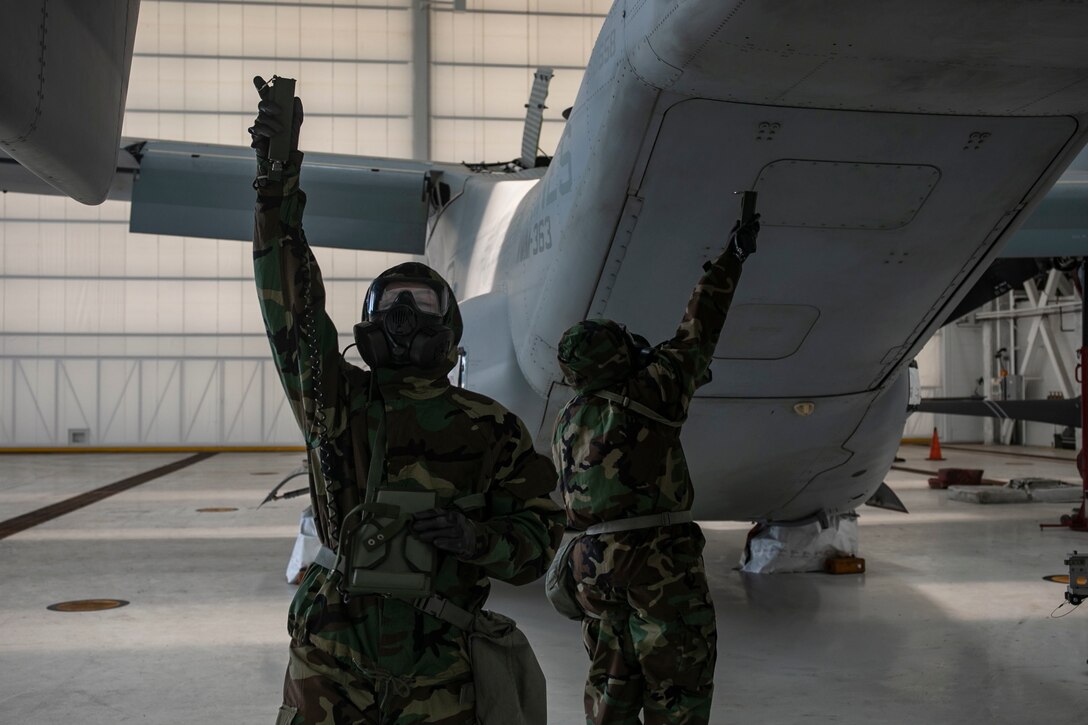 U.S. Marines demonstrate how to look for radioactive particles during a Chemical, Biological, Radiological and Nuclear (CBRN) defense practical application evaluation, Marine Corps Air Station, Kaneohe Bay, Aug. 8, 2019. Marine Corps Base Hawaii supported the effort of United States Army Pacific Command whose main focus was CBRN. (U.S. Marine Corps photo by Pfc. Jose Angeles)