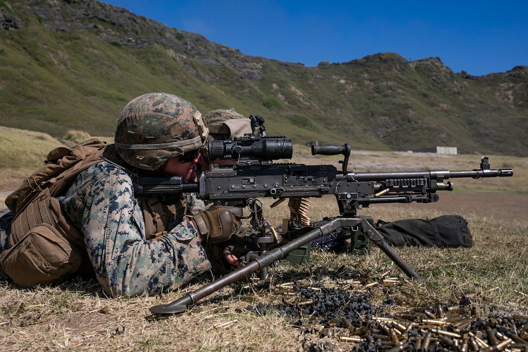 U.S. Marines with Combined Anti-Armor Team, 1st Battalion 3d Marines, fire a M240B machine gun during a combined arms rehearsal, Kaneohe Bay Range Training Facility, Marine Corps Base Hawaii, Aug. 11 2019. This training allowed the Marines to move ground units into position while engaging the enemy forces with machine guns. (U.S. Marine Corps photo by Pfc. Jose Angeles)
