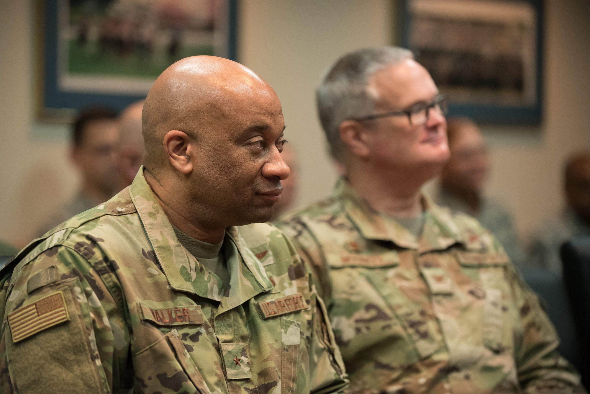 The Kentucky Air National Guard’s chief of staff, Brig. Gen. Charles Walker (left) and Col. David Mounkes, commander of the 123rd Airlift Wing, attend a ceremony at the Kentucky Air National Guard base in Louisville, Ky., Aug. 10, 2019, during which Brig. Gen. Warren Hurst, Kentucky’s assistant adjutant general for Air, was awarded the Distinguished Service Medal. The honor recognizes exceptionally meritorious service in duties of great responsibility. (U.S. Air National Guard photo by Dale Greer)