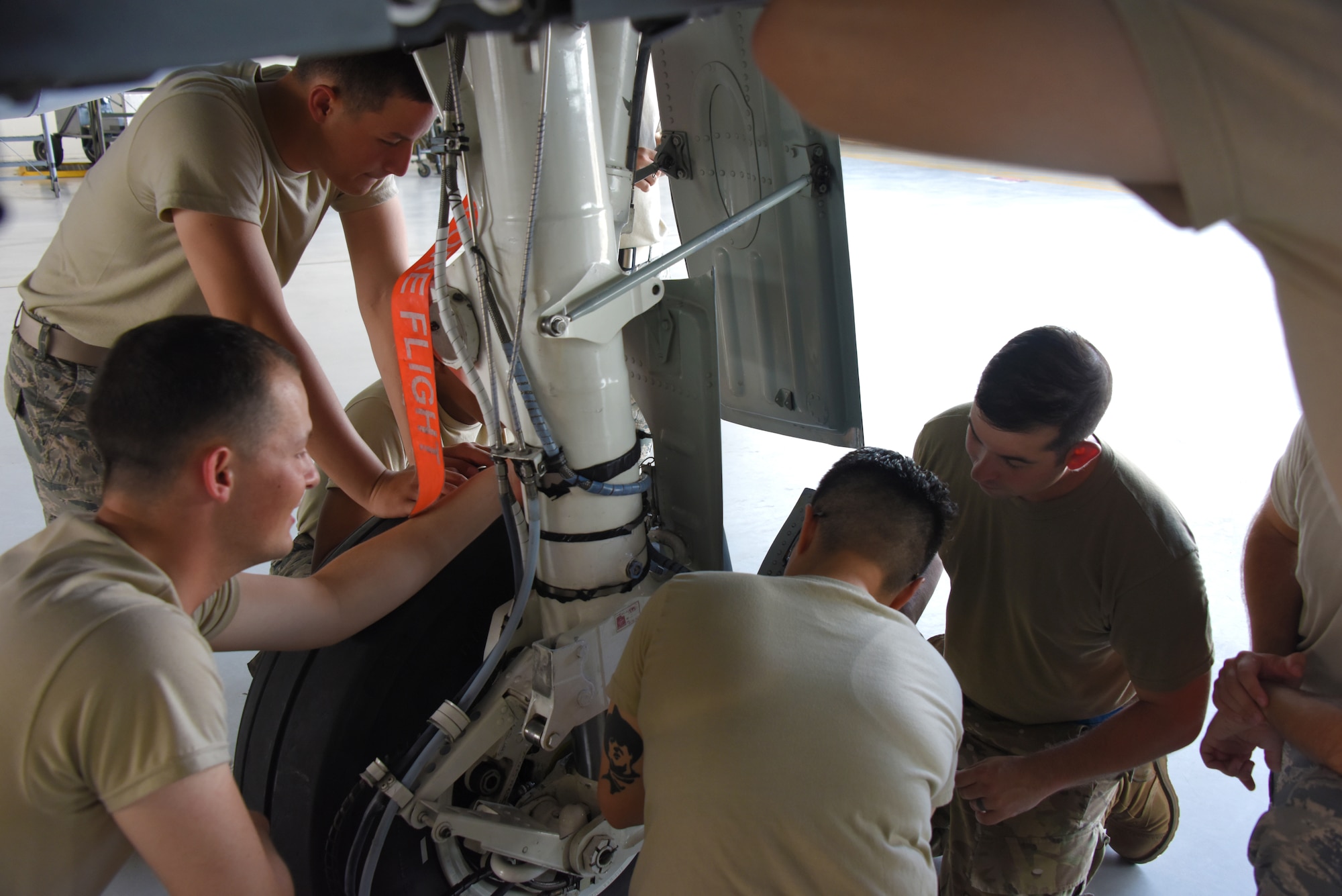 362nd Training Squadron instructor and students review lower torque arm of an A-10 at Sheppard AFB, TX.