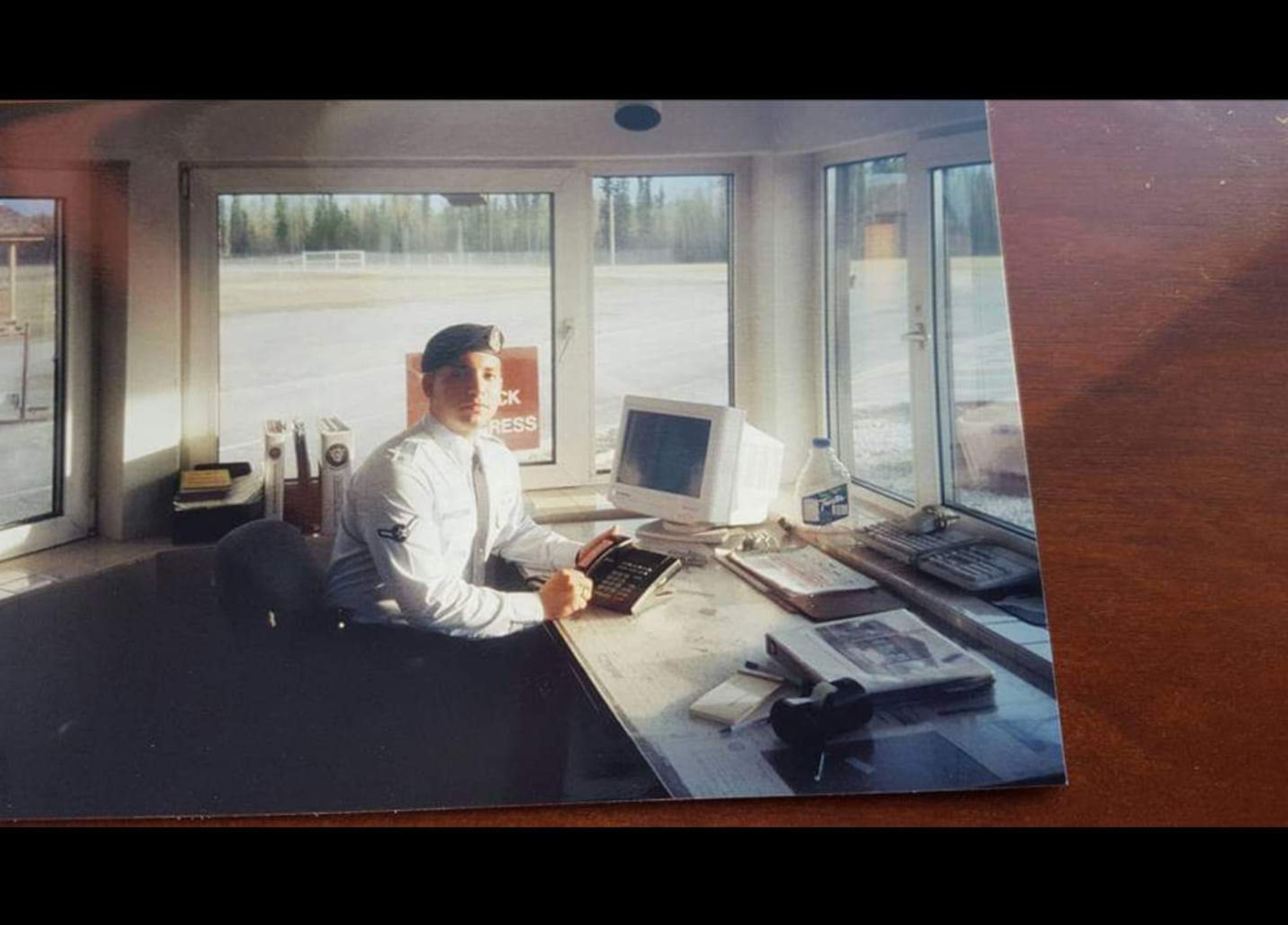 U.S. Air Force Chief Master Sgt. Steve Cenov, 8th Fighter Wing Command chief, stands guard at an installation entry control point at Eielson Air Force Base in June 2000. (Courtesy photo)