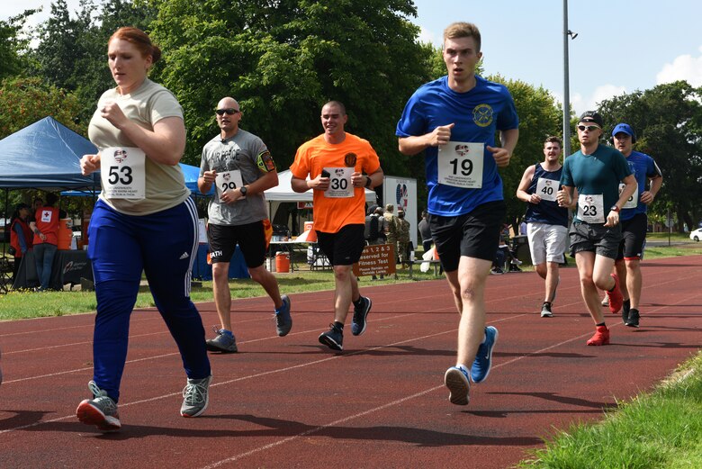 Liberty Wing Airmen participate in the Operation Warm Heart run-a-thon at Royal Air Force Lakenheath, England, Aug. 2, 2019. Operation Warm Heart is a non-profit organization through the First Sergeant Council that provides emergency funds and relief for Airmen. (Courtesy photo by Carissa Chae)