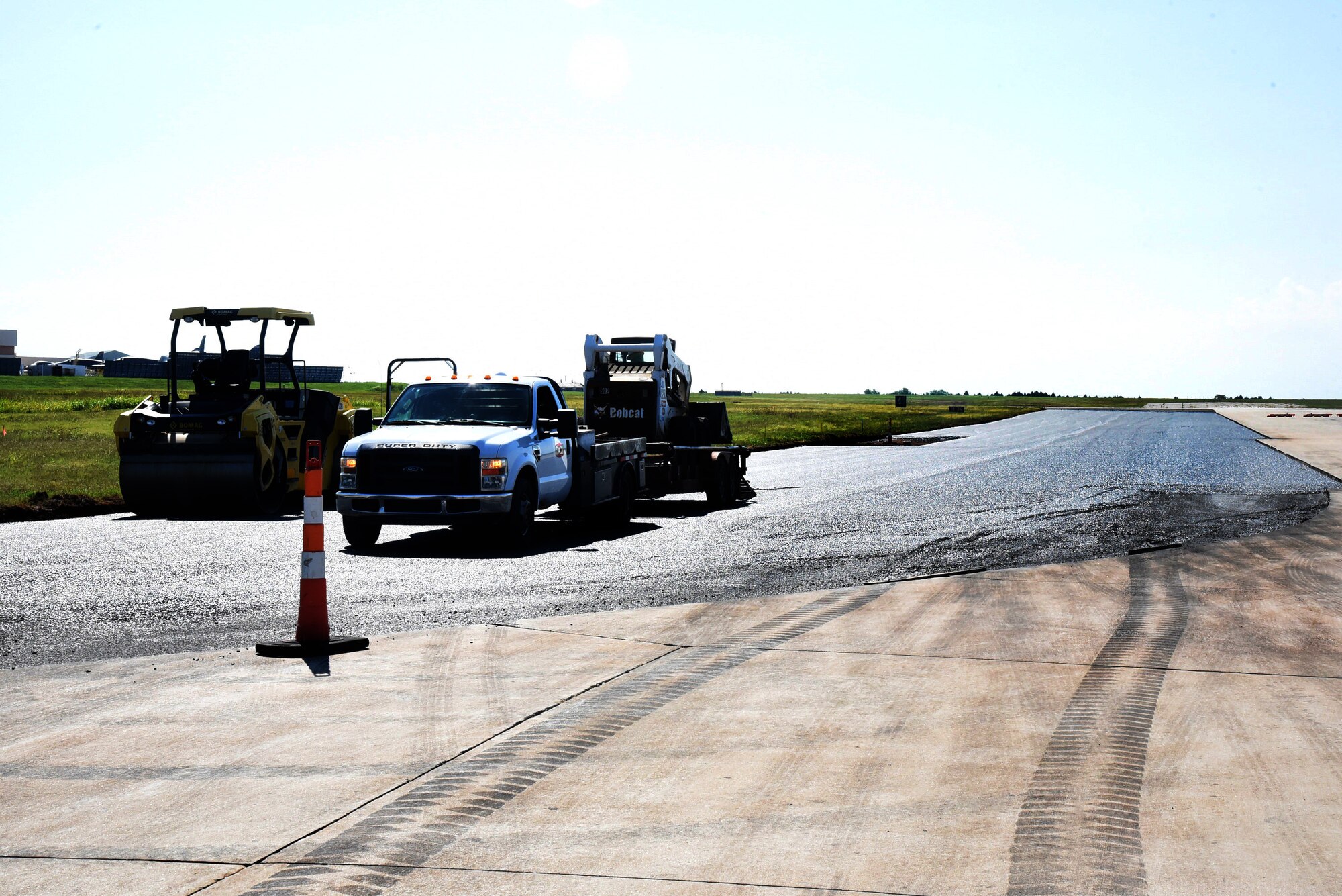 Runway 13/31 is currently undergoing construction to the outer 75ft. on each side, receiving fresh asphalt. (U.S. Air Force photo/Kelly White)