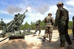 Moldovan National Army Lt. Victor Suceanu, a field artillery officer, fires an M777A2 Howitzer during a visit to the 139th Regional Training Institute at Fort Bragg on Aug. 12, 2019.  The North Carolina National Guard has partnered with Moldova for over 20 years as part of the State Partnership Program.