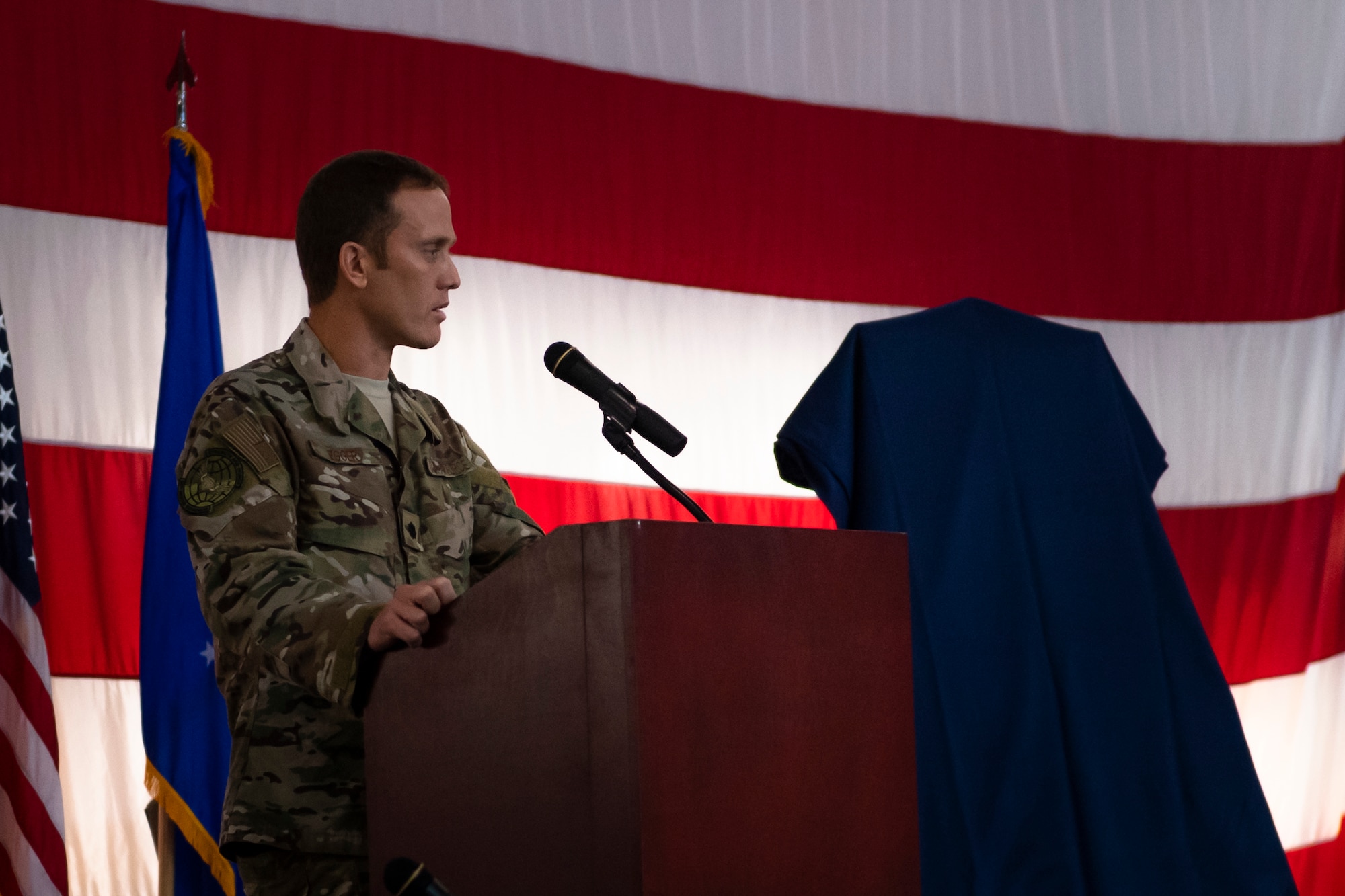 Lt. Col. Jason Egger, 38th Rescue Squadron (RQS) commander, speaks during a dedication ceremony Aug. 16, 2019, at Moody Air Force Base, Ga. The event room in building 400 at Moody was dedicated to and renamed in honor of Capt. Mark Weber, 38th RQS combat rescue officer. Weber, a Texas native, was killed in an HH-60G Pave Hawk crash in Anbar Province, Iraq, March 15, 2018, while supporting Operation Inherent Resolve. (U.S. Air Force photo by Airman 1st Class Taryn Butler)
