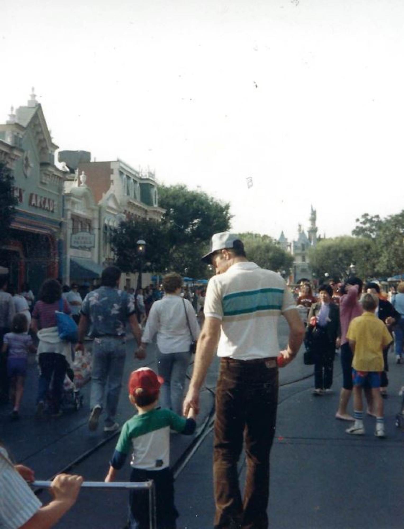 Lt. Col. Kenneth Huston and his son Jeffrey walk down Main Street at Disneyland. (Courtesy Photo)