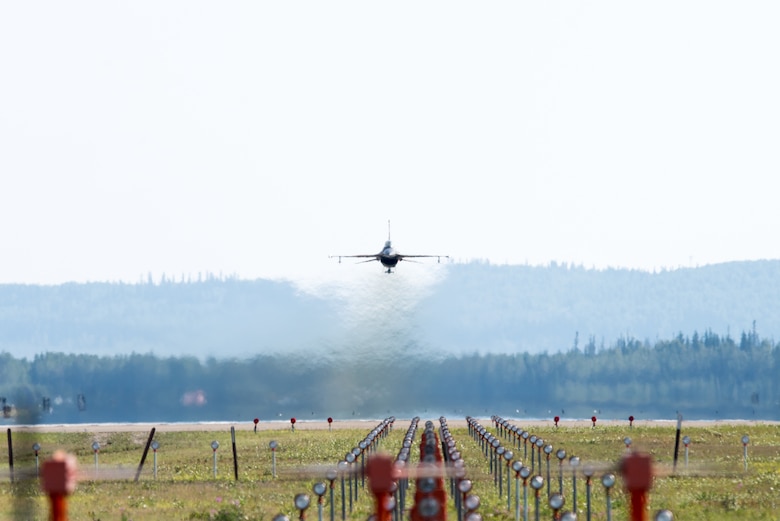 An F-16 Fighting Falcon takes off during Red Flag-Alaska