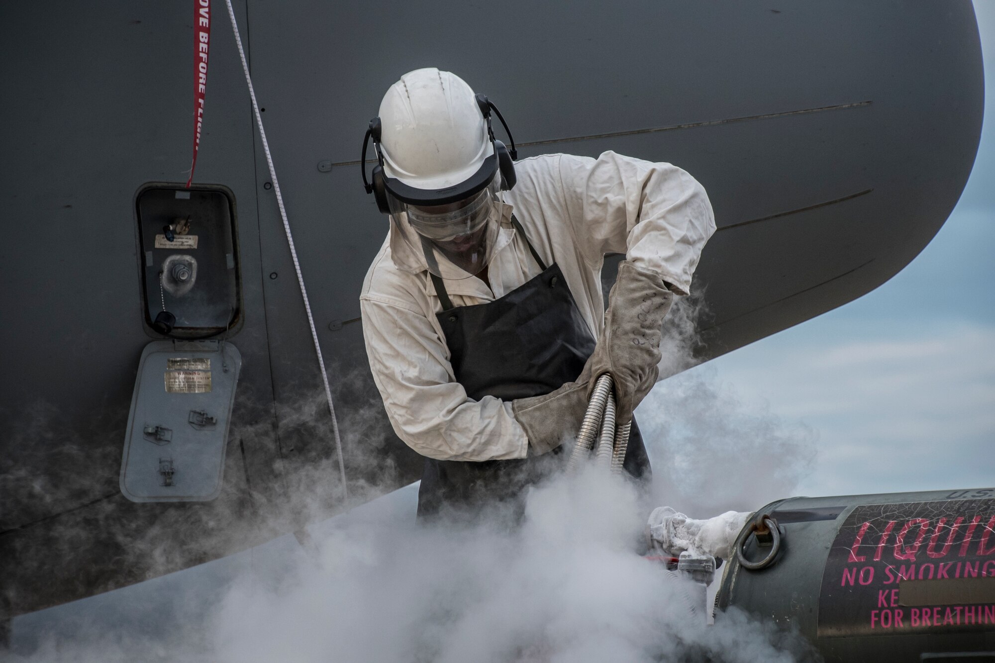 Tech. Sgt. refills the C-130H Hercules with liquid oxygen