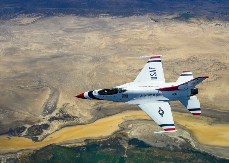 An F-16C Fighting Falcon "Thunderbirds" flies over the Pacific Northwest region