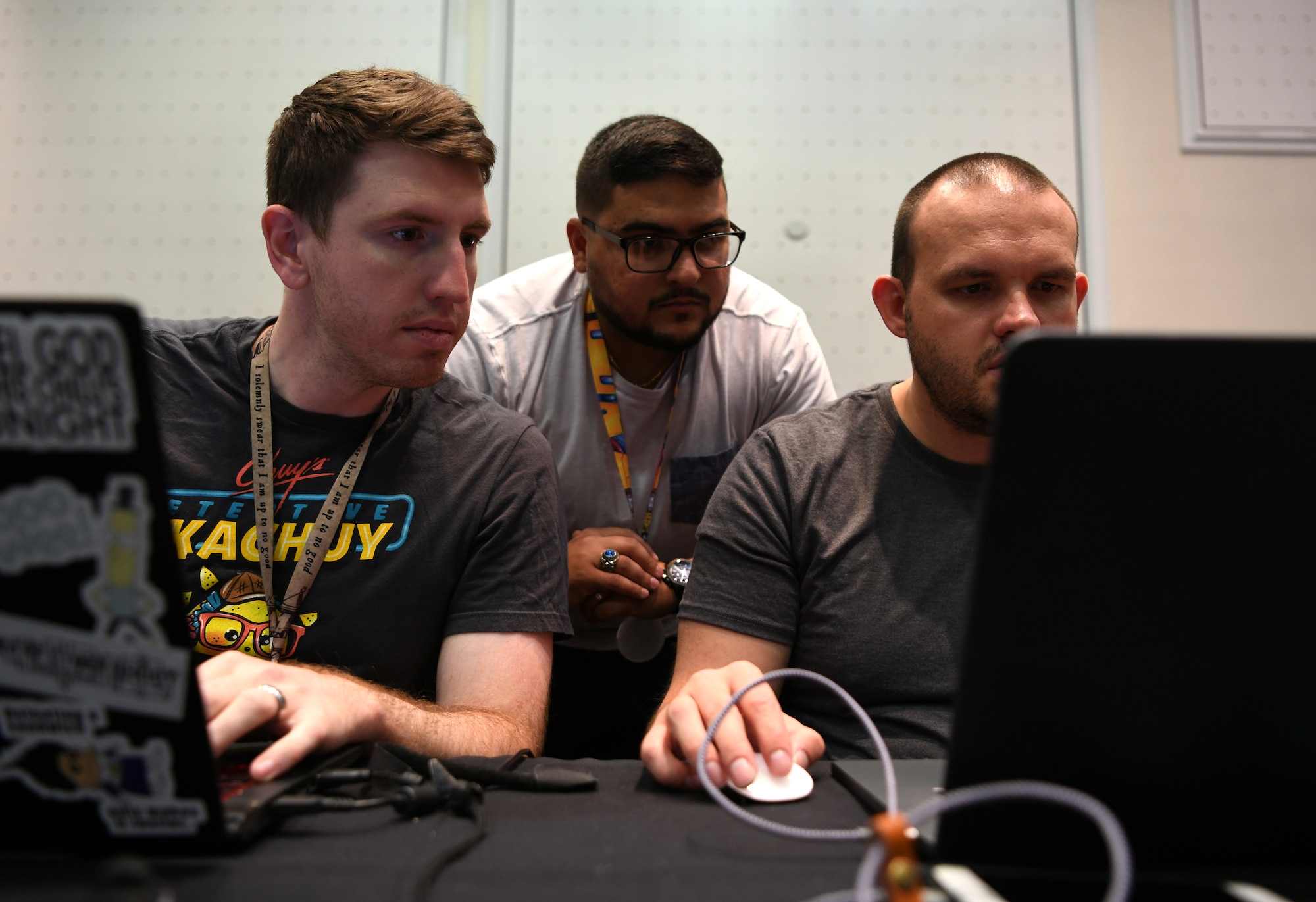 Air Force cyber warfare operators set up their computer stations before a capture-the-flag competition during DEF CON 27 Hacking Conference in Las Vegas, Aug. 8, 2019. The operators participated in a number of DEF CON events to showcase their knowledge and experience. (U.S. Air Force photo by Tech. Sgt. R.J. Biermann)