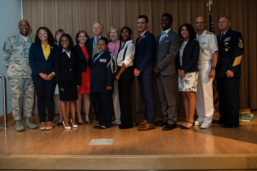 Group of people pose for a photo.