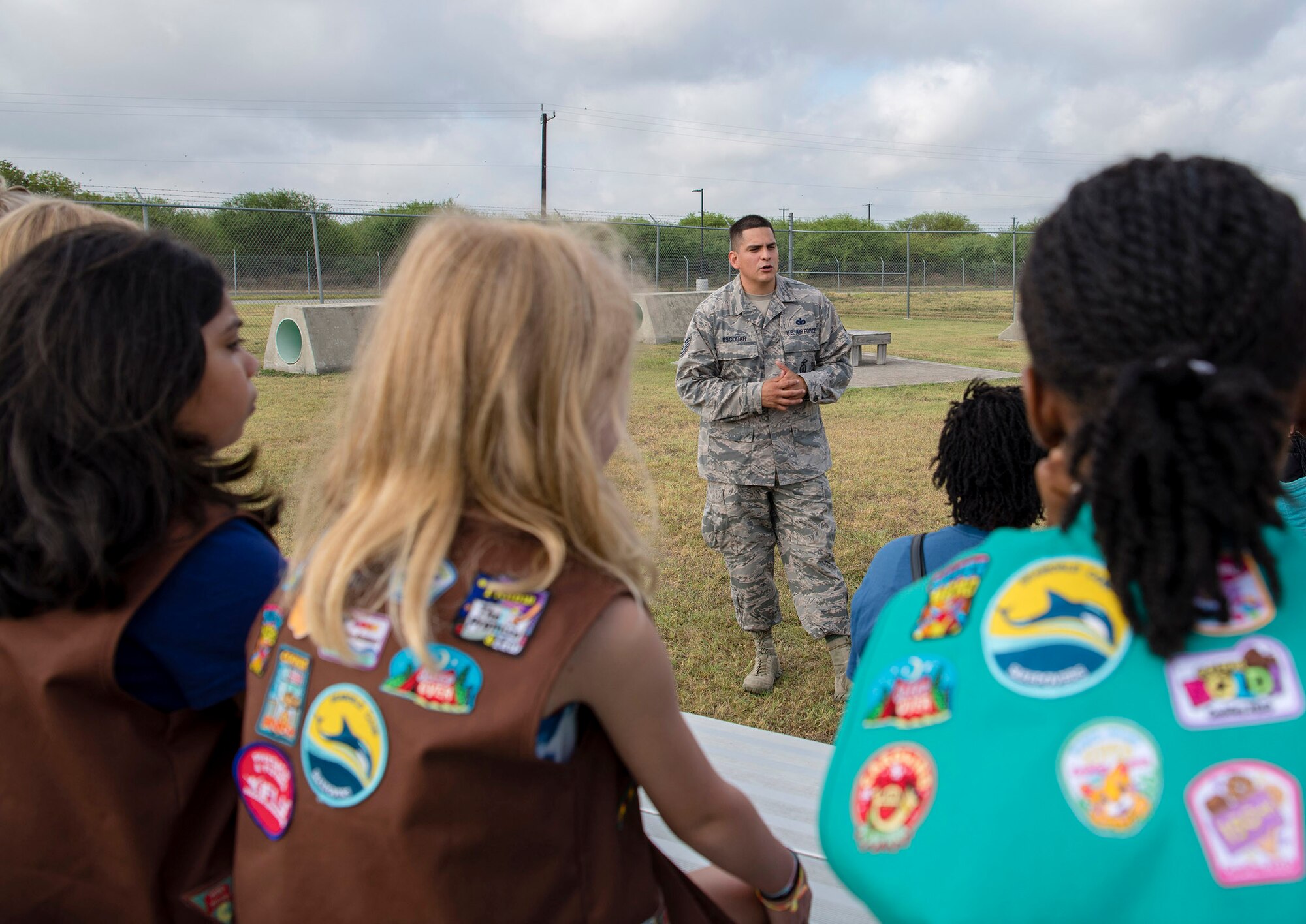 South West Texas Girl Scout Troop 367 toured Joint Base San Antonio-Randolph Aug. 9,  witnessing a military working dog demonstration at the 902nd Security Forces Squadron kennel, visiting the 902nd Civil Engineer Squadron fire department and touring the base’s static aircraft display. (U.S. Air Force photo by Sabrina Fine)