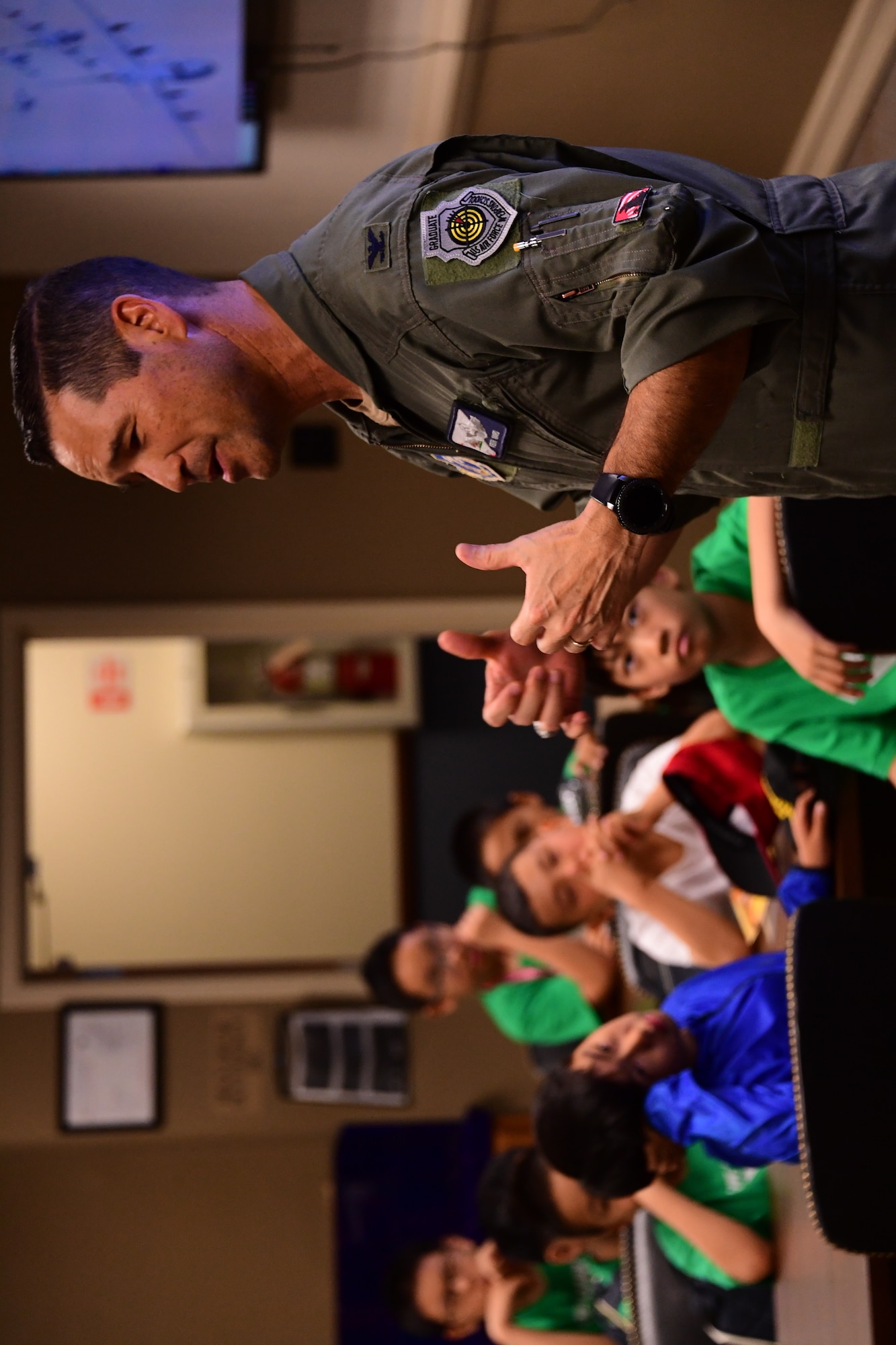 U.S. Air National Guard Col. Keith Ward commander 146th Airlift Wing, converses with a group of students attending a summer camp with St. Stephen’s Academy during a base tour at the Channel Islands Air National Guard Station, Port Hueneme, CA. July 25, 2019. (U.S. Air National Guard photo by Tech. Sgt. Nieko Carzis)