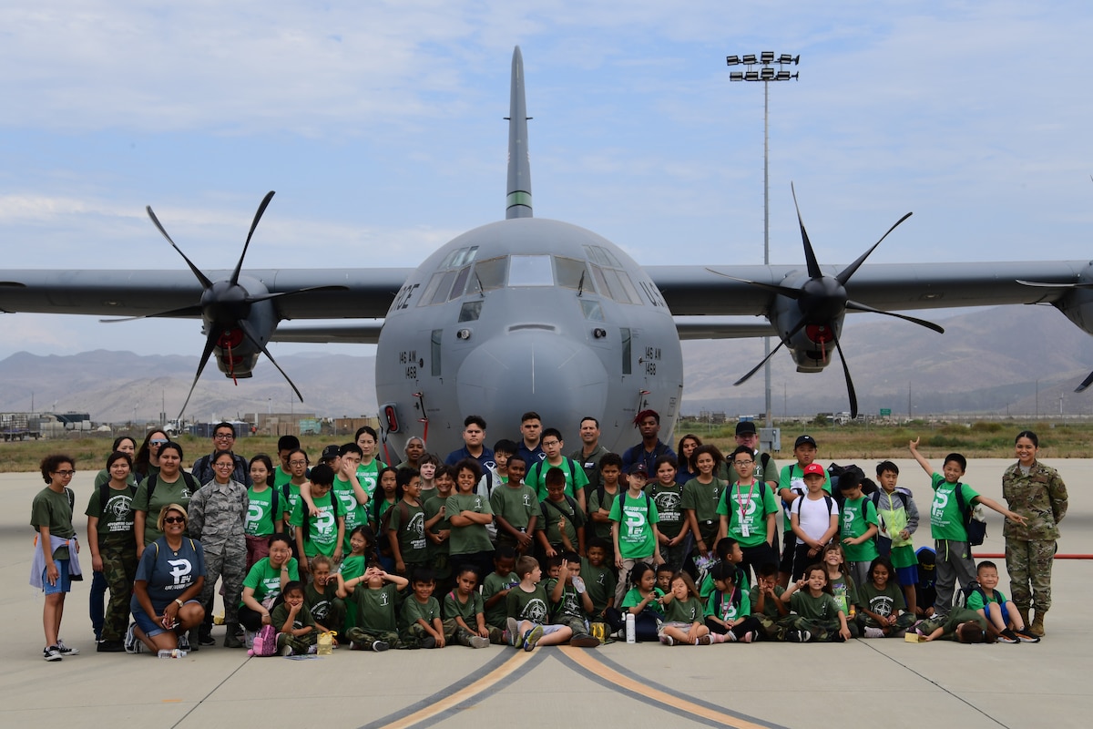 U.S. Air National Guard personnel from the 146th Airlift Wing provide a base tour to students attending a summer camp with St. Stephen’s Academy at the Channel Islands Air National Guard Station, Port Hueneme, CA. July 25, 2019. (U.S. Air National Guard photo by Tech. Sgt. Nieko Carzis)