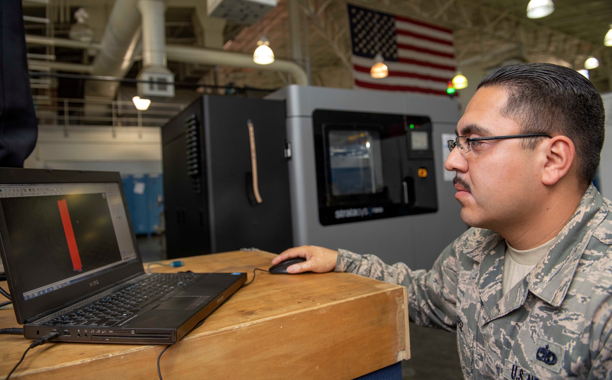 Travis AFB is the first field-unit location in the Air Force to have the Stratays F900 3-D industrial printer certified by the Federal Aviation Administration and Air Force Advanced Technology and Training Center for use on aircraft replacement parts. (U.S. Air Force photo by Louis Briscese)