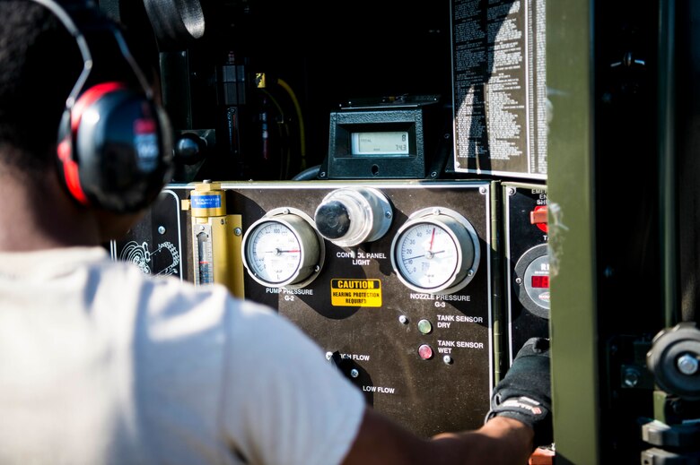 U.S. Airmen assigned to the 67th Aircraft Maintenance Unit, Kadena Air Base, Japan, prepare an F-15 Eagle for takeoff at Allen Army Airfield during Red Flag-Alaska 19-3 at Fort Greely, Alaska, Aug. 8, 2019. During the exercise, Fort Greely was used to implement agile combat employment, which allows aircraft maintainers to perform maintenance operations in remote locations with as few people as possible. (U.S. Air Force photo by Senior Airman Isaac Johnson)