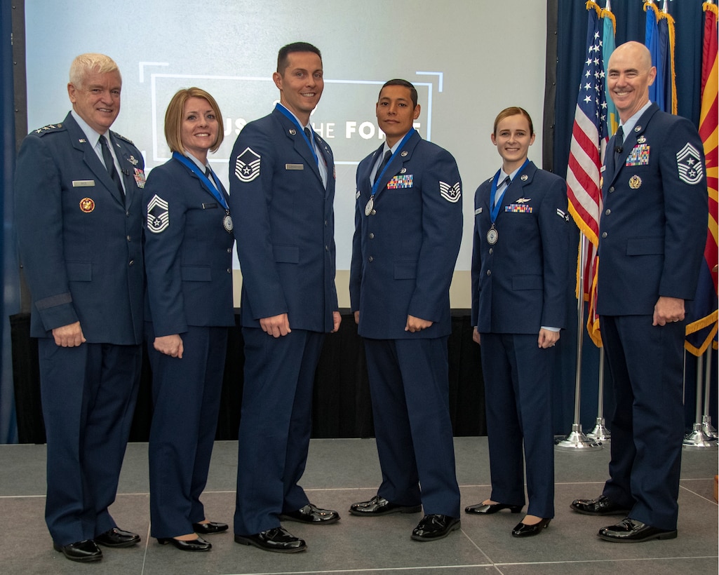 U.S. Air Force Lt. Gen. L. Scott Rice, director of the Air National Guard (ANG), Chief Master Sgt. Rachel L. Landegent, Master Sgt. Mark J. Jurakovich, Tech. Sgt. Andrew Merrylees, Airman 1st Class Kaleigh M. Bevan and Command Chief Master Sgt. Ronald C. Anderson, ANG command chief, pose for photo during the recognition ceremony of Focus on the Force held at the Air National Guard Readiness Center, Joint Base Andrews, Md., Aug. 15, 2019. Focus on the force week is a week-long series of events, with emphasis on Air National Guard enlisted force growth and development through collaboration of leadership and subject matter experts including the ANG’s four Outstanding Airmen of the Year. (U.S. Air National Guard photo by Master Sgt. David J. Fenner)