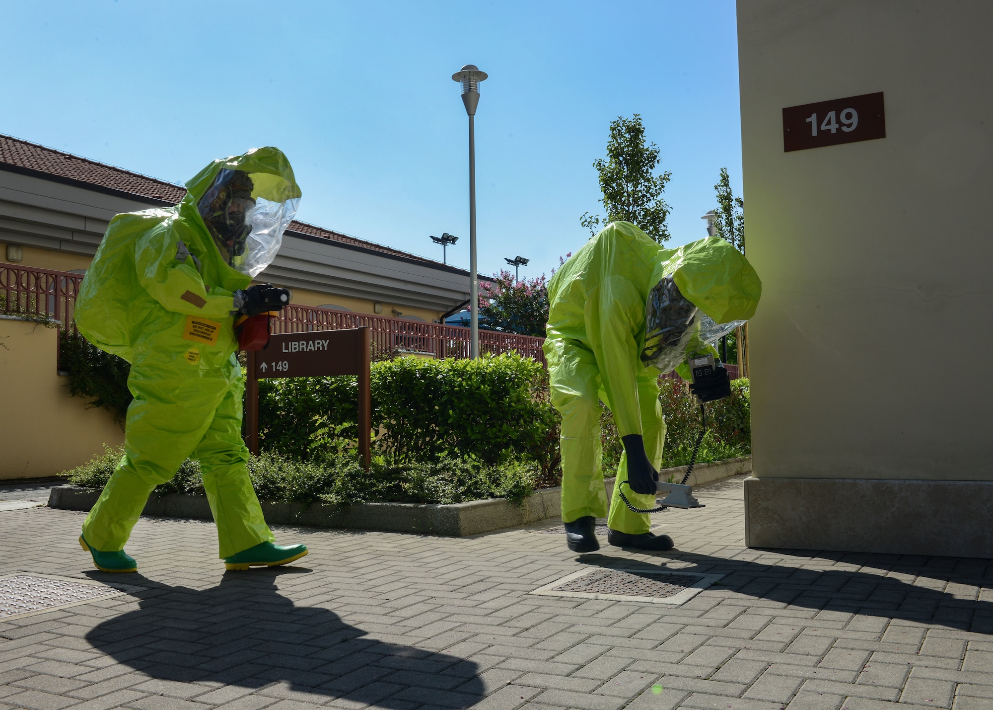 Airmen from the 31st Aerospace Medicine Squadron Bioenvironmental Engineering flight read a mock hazardous scene during exercise Ready EAGLE at Aviano Air Base, Italy, Aug. 9, 2019. To prevent contamination or danger to first responders and other personnel, BE monitors a variety of different potentially hazardous issues, such as chemicals and radioactivity. (U.S. Air Force photo by Staff Sgt. Rebeccah Woodrow)
