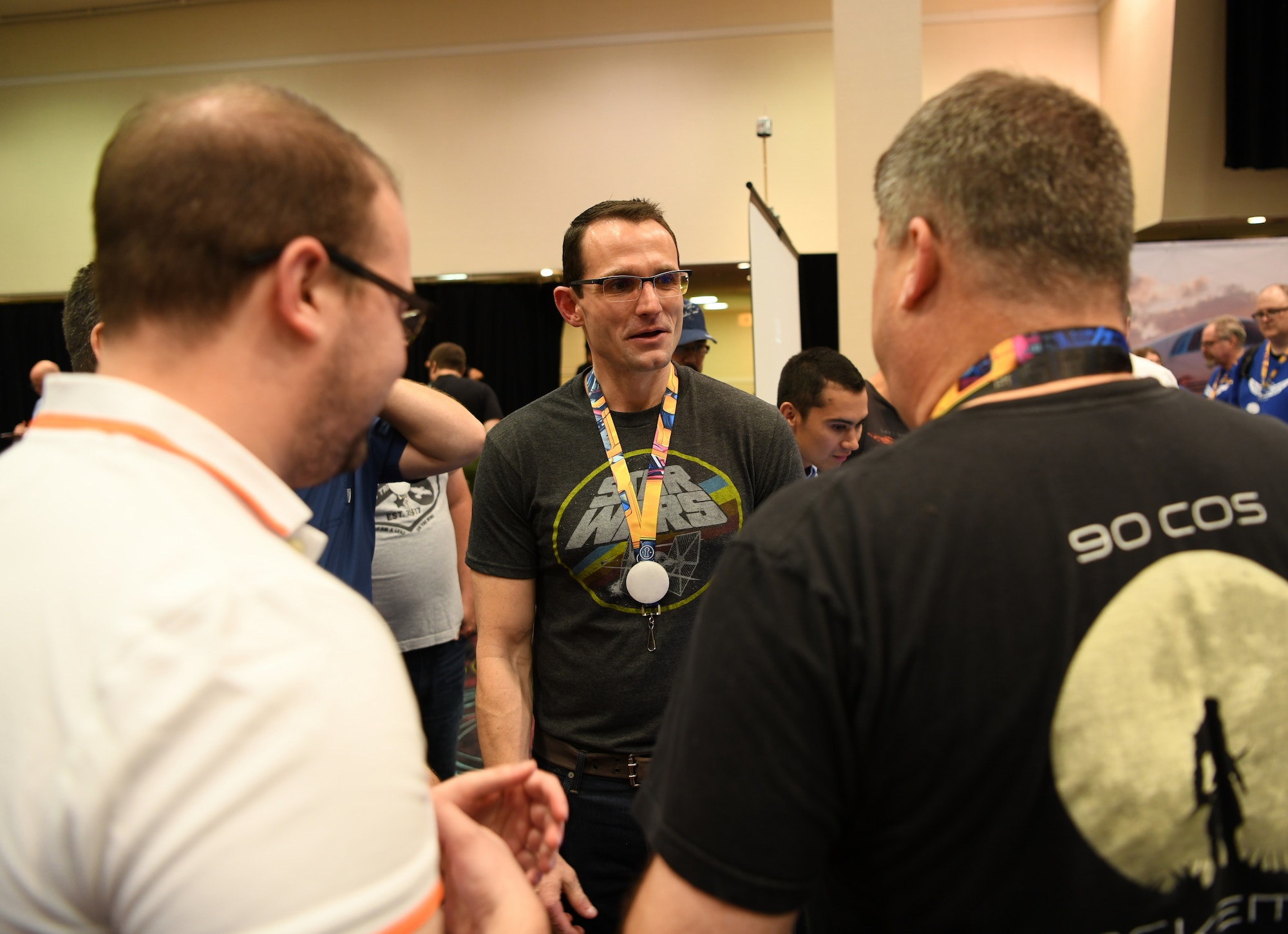 Airmen from the 90th Cyberspace Operations Squadron host Dr. Will Roper, Assistant Secretary of the Air Force for Acquisition, Technology and Logistics, for a “Bricks in the Loop” presentation at DEF CON 27 Hacking Conference in Las Vegas, Aug. 9, 2019. “Bricks in the Loop” mimics an air force installation to simulate real-world cyber systems in training cyber operators. (U.S. Air Force photo by Tech. Sgt. R.J. Biermann)