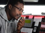 MSC Civil Service Mariner Abraham Asante, first engineer of the Spearhead-class expeditionary fast transport ship USNS Carson City (T-EPF 7), talks with an engineering team conducting rounds while standing bridge watch in support of the ship's Africa Partnership Station deployment.