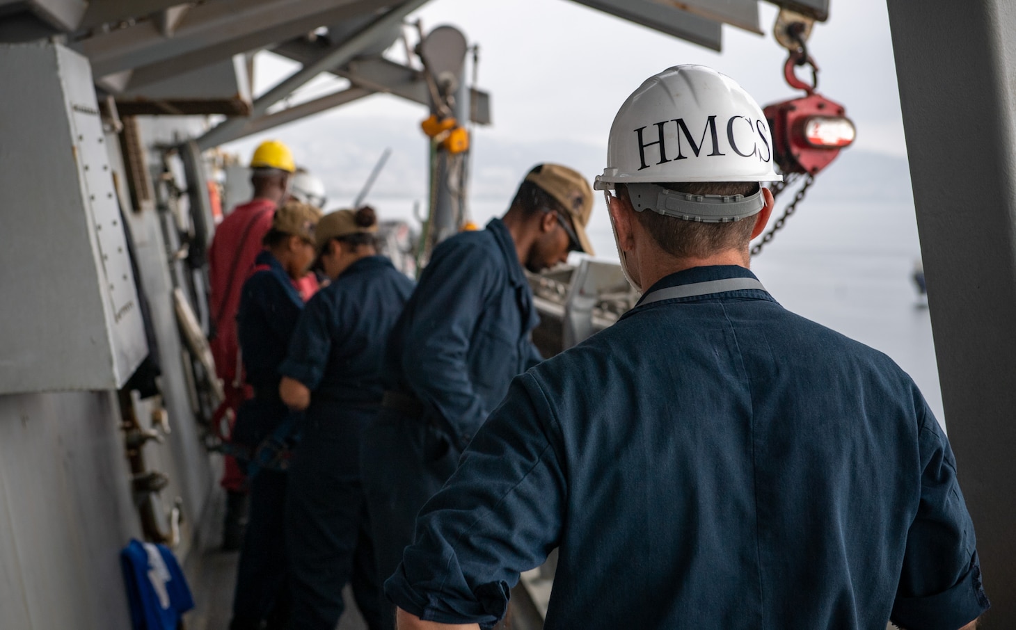 Senior Chief Hospital Corpsman Jermy Brower, assigned to the Arleigh Burke-class guided-missile destroyer USS Porter (DDG 78), stands a medical coverage watch during a sea and anchor detail as the ship arrives in Golcuk, Turkey, Aug. 16, 2019.