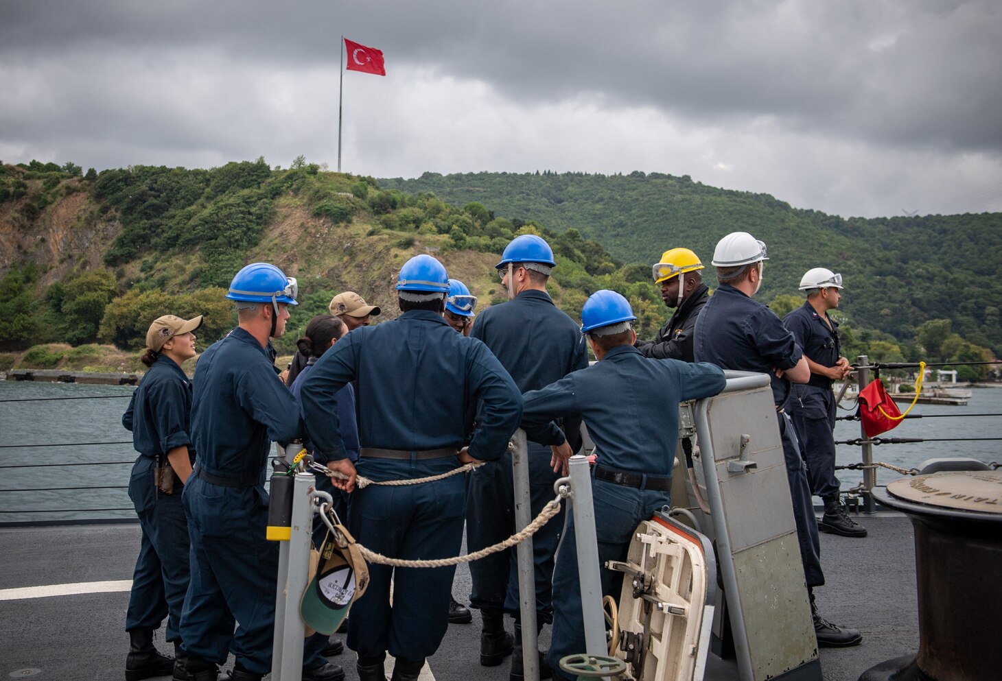 Sailors assigned to the Arleigh Burke-class guided-missile destroyer USS Porter (DDG 78) stand by during a sea and anchor detail as the ship prepares to arrive in Golcuk, Turkey, Aug. 16, 2019.
