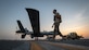 Maintainers with the 386th Expeditionary Aircraft Maintenance Squadron tow a U.S. Air Force MQ-9 Reaper remotely piloted aircraft into position for an engine test prior to Intelligence, Surveillance, and Reconnaissance operations at Ali Al Salem Air Base, Kuwait, July 23, 2019. Reaper’s are maintained, launched and recovered from deployed locations, but are remotely operated from bases in the United States during ISR operations around the world. (U.S. Air Force Photo by Tech. Sgt. Michael Mason, tail number obscured for operational security)