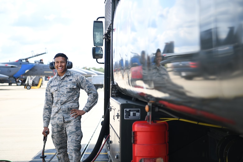 U.S. Air Force Airman 1st Class Christopher Flores-Rivera, 48th Logistics Readiness Squadron fuels distribution operator apprentice, monitors a fuel line on the flightline at Royal Air Force Lakenheath, England, Aug. 13, 2019. The Fuels Management Flight acquires, manages, distributes and maintains the fuel necessary to ensure aircraft from assigned to the 48th Fighter Wing are ready to fly. (U.S. Air Force photo by Airman 1st Class Shanice Williams-Jones)