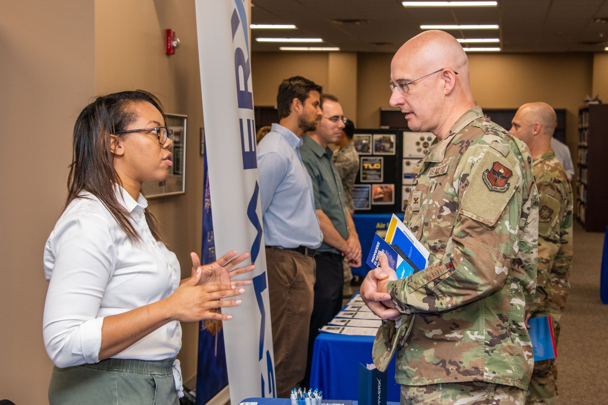 A wing commander attending Air University’s immersion orientation speaks with a representative from the school, Aug. 13, 2019, on Maxwell Air Force Base, Alabama. The event was designed to showcase how Air University has changed since some of them attended courses and the strides made in educating future leaders.