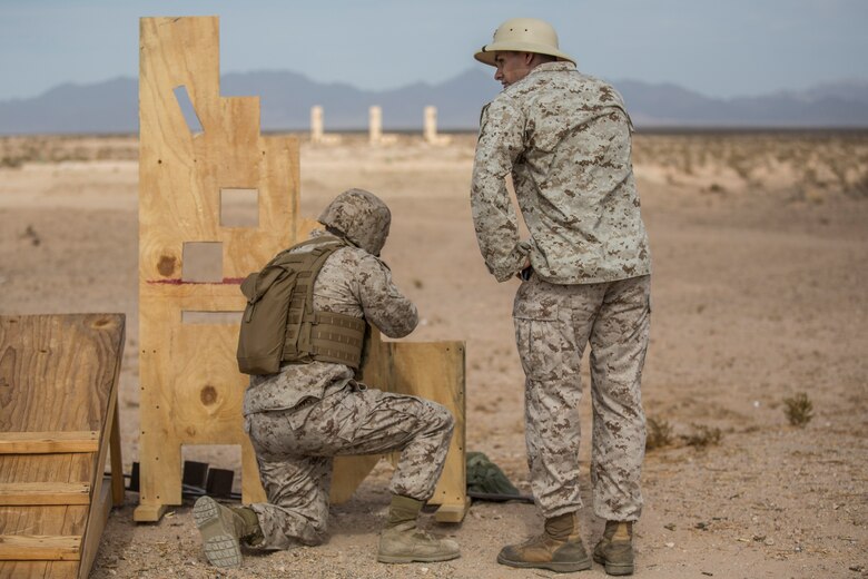 U.S. Marines stationed on Marine Corps Air Station (MCAS) Yuma, Ariz., conduct live-fire training qualifications during tables three and four of Combat Marksmanship Coach's Course 3-19 at MCAS Yuma's Range 1 , July 29, 2019. Tables three and four require that Marines shoot targets at unknown distances from supporting firing positions. (U.S. Marine Corps photo by Cpl. Sabrina Candiaflores)