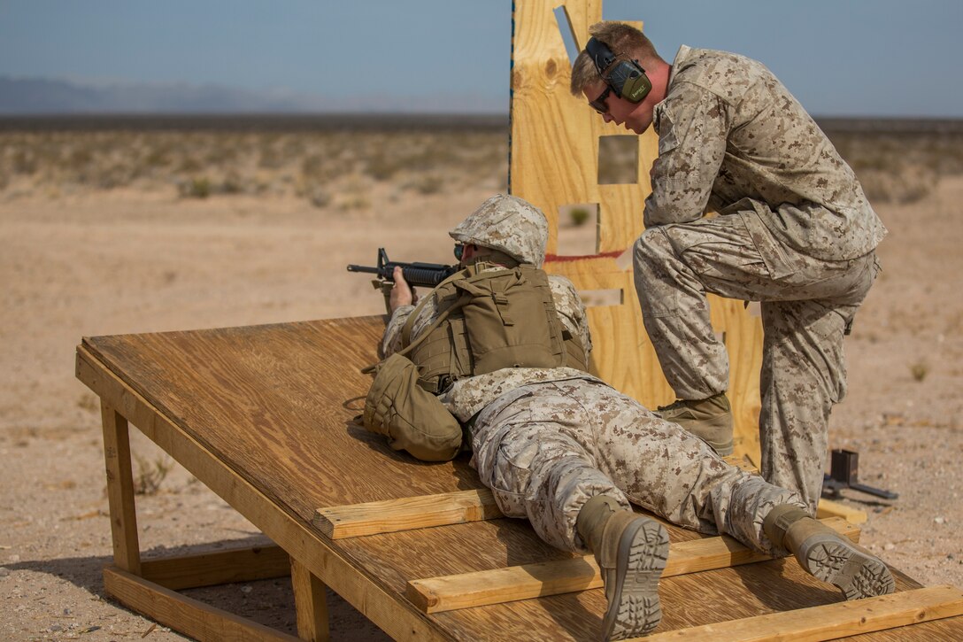 U.S. Marines stationed on Marine Corps Air Station (MCAS) Yuma, Ariz., conduct live-fire training qualifications during tables three and four of Combat Marksmanship Coach's Course 3-19 at MCAS Yuma's Range 1 , July 29, 2019. Tables three and four require that Marines shoot targets at unknown distances from supporting firing positions. (U.S. Marine Corps photo by Cpl. Sabrina Candiaflores)