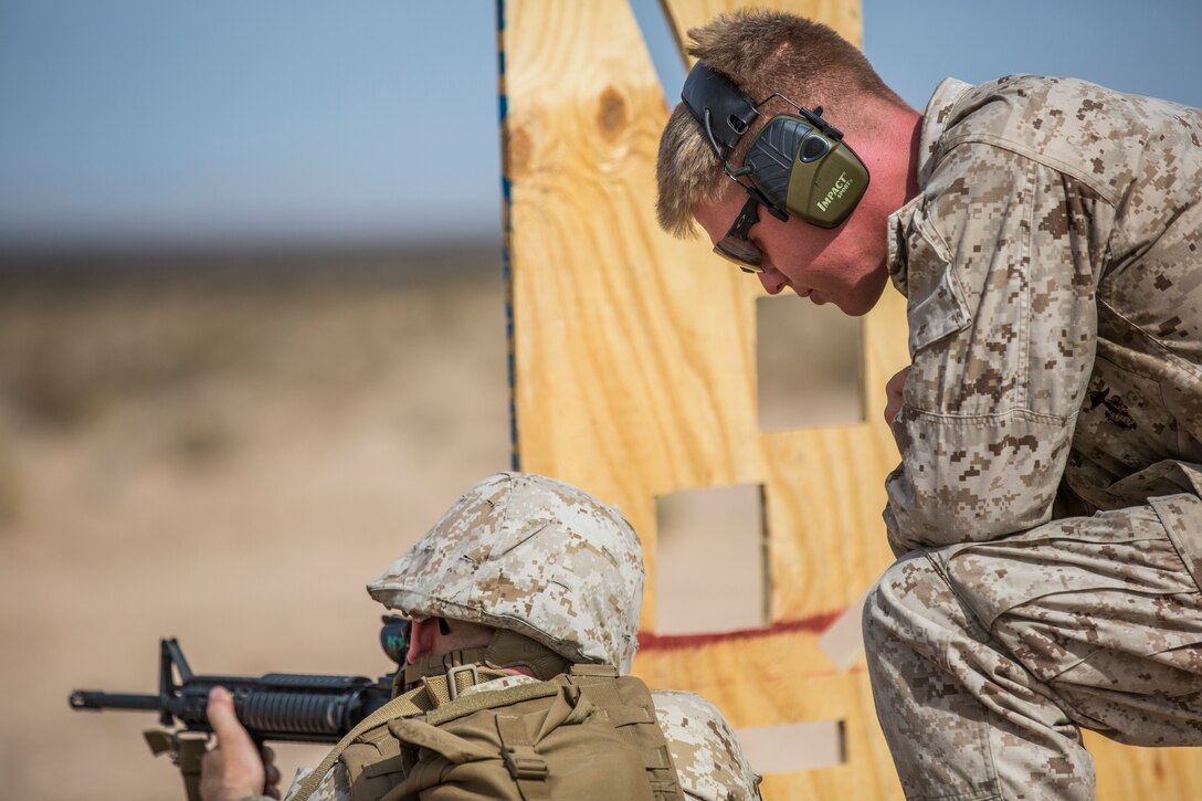 U.S. Marines stationed on Marine Corps Air Station (MCAS) Yuma, Ariz., conduct live-fire training qualifications during tables three and four of Combat Marksmanship Coach's Course 3-19 at MCAS Yuma's Range 1 , July 29, 2019. Tables three and four require that Marines shoot targets at unknown distances from supporting firing positions. (U.S. Marine Corps photo by Cpl. Sabrina Candiaflores)