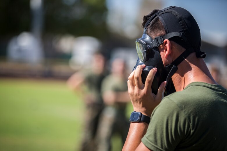 U.S. Marines stationed at Marine Coprs Air Station (MCAS) Yuma, recieve their training in order to become a squadron decontamination team at MCAS Yuma, Ariz., August 14, 2019. Each squadron is required to have a decontamination team that is trained quarterly by a Chemical, Biological, Radiological and Nuclear Defense Specialist. (U.S. Marine Corps photo by Lance Cpl. John Hall)
