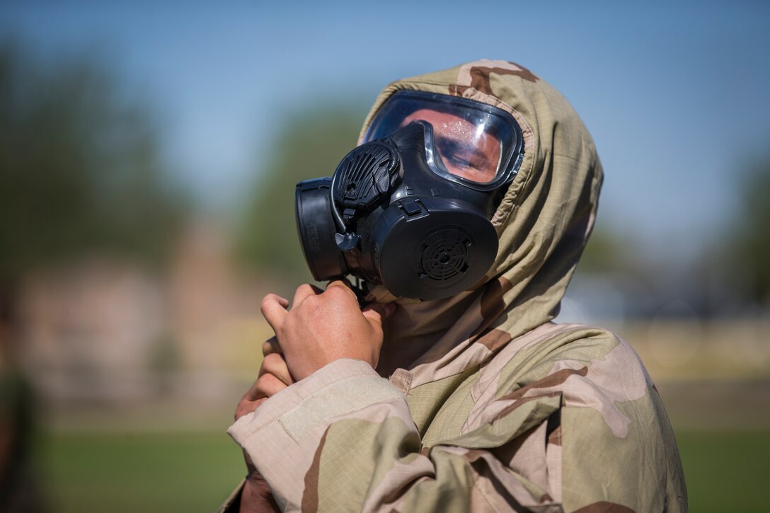 U.S. Marines stationed at Marine Coprs Air Station (MCAS) Yuma, recieve their training in order to become a squadron decontamination team at MCAS Yuma, Ariz., August 14, 2019. Each squadron is required to have a decontamination team that is trained quarterly by a Chemical, Biological, Radiological and Nuclear Defense Specialist. (U.S. Marine Corps photo by Lance Cpl. John Hall)