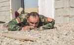 A Zeravani policeman from 2nd Battalion 3rd Brigade Zeravani checks for possible a improvised explosive devices (IED) during Counter-IED detect and defeat training at Bnaslawa Training Center, Iraq, July 25, 2019. Peshmerga police conduct detect and defeat training to identify and properly disrupt IEDs commonly found on the battlefield. The Italian Army Mobile Training Team from the Kurdistan Training Coordination Center oversaw the training. Combined Joint Task Force- Operation Inherent Resolve training programs include courses in areas as diverse as operational planning, counter-terrorism, logistics and sustainment, equipment maintenance, counter-IED techniques and law enforcement. (U.S. Army photo by Spc. Kahlil Dash)