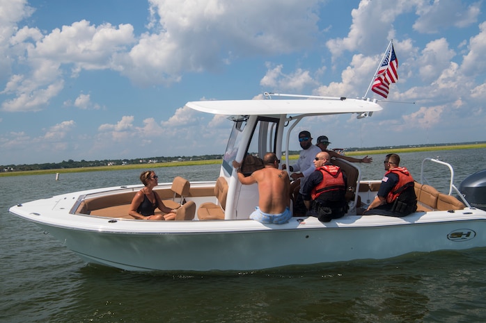 U.S. Coast Guard Petty Officer 2nd Class Alexander Ford, a boatswain’s mate assigned to USCG Station Charleston, helms a patrol vessel in support of Operation SHRIMP and GRITS in Charleston Harbor, August 9, 2019. Operation SHRIMP and GRITS is an annual multi-jurisdiction and multi-state maritime  law enforcement operation that promotes safety to recreational and commercial boaters traveling along the water across South Carolina, North Carolina, Georgia and Florida. Approximately 104 different agencies in the four states participated in the operation with the U.S. Coast Guard, covering about 500 miles of coastline.