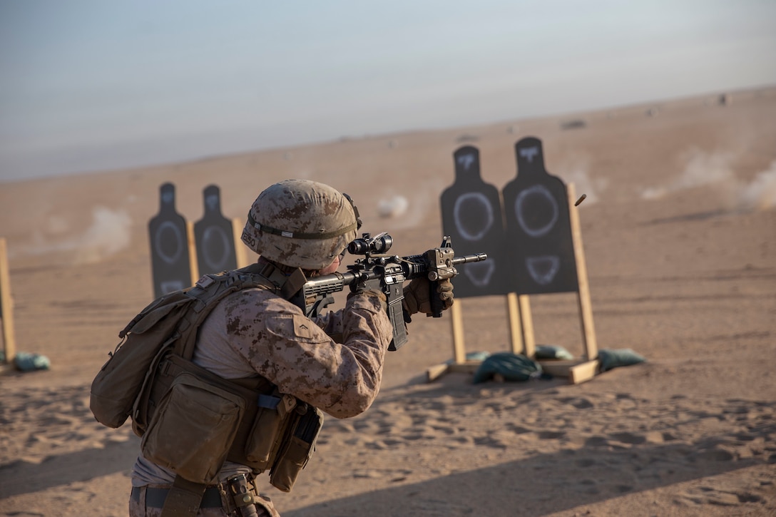 190728-M-MI961-1049 CAMP BUEHRING, Kuwait July 28, 2019 Lance Cpl. Seth Kelso with Lima Company, Battalion Landing Team 3/5, 11th Marine Expeditionary Unit fires an M4 carbine at a target during live-fire training. The Boxer Amphibious Ready Group and the 11th MEU are deployed to the U.S. 5th Fleet area of operations in support of naval operations to ensure maritime stability and security in the Central Region, connecting the Mediterranean and the Pacific through the Western Indian Ocean and three strategic choke points.