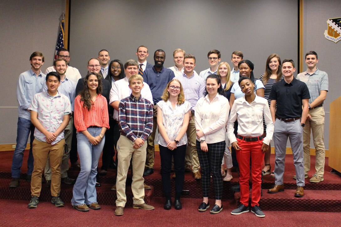 National Aerospace Solutions, LLC (NAS) interns pose for a photo to commemorate their summer spent at Arnold Air Force Base. This group of interns, who are from colleges and universities across the United States, made up the largest group of summer interns NAS has had since starting its internship program in 2017. (U.S. Air Force photo by Deidre Ortiz)